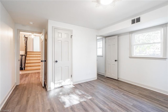 unfurnished bedroom with light hardwood / wood-style floors