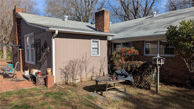 view of home's exterior with a patio