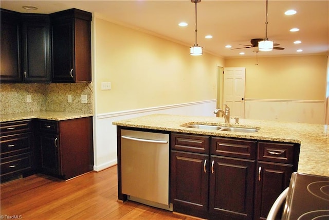 kitchen featuring sink, light wood-type flooring, dishwasher, range with electric cooktop, and hanging light fixtures