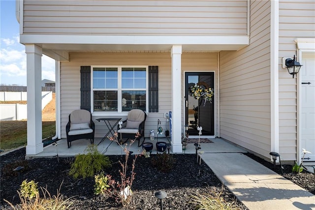 doorway to property with a porch