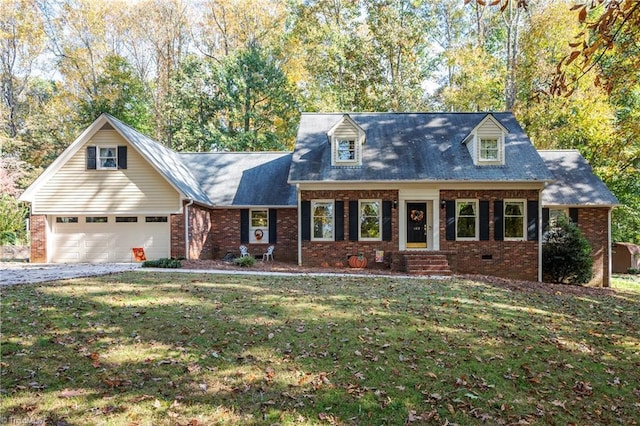 cape cod house with a garage and a front yard