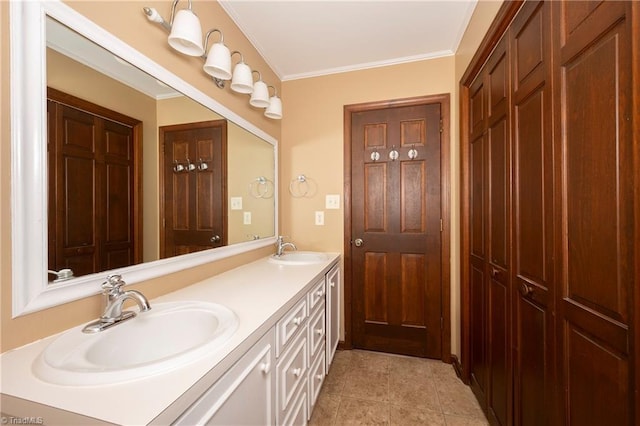 bathroom featuring vanity, tile patterned floors, and ornamental molding