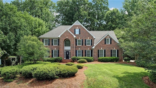 3612 Camden Falls Cir, Greensboro, NC 27410 - view of front facade with a front lawn and brick siding