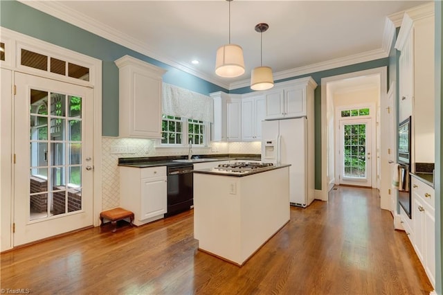 3612 Camden Falls Cir, Greensboro, NC 27410 - kitchen featuring black dishwasher, white refrigerator with ice dispenser, dark countertops, dark wood-style flooring, and white cabinets