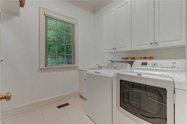 3612 Camden Falls Cir, Greensboro, NC 27410 - washroom with separate washer and dryer, cabinet space, and ornamental molding