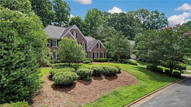 3612 Camden Falls Cir, Greensboro, NC 27410 - colonial home with a front lawn and brick siding