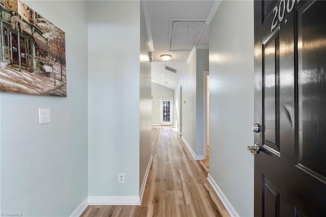 corridor featuring light hardwood / wood-style floors