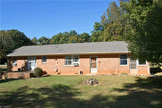 view of front of house with a front lawn