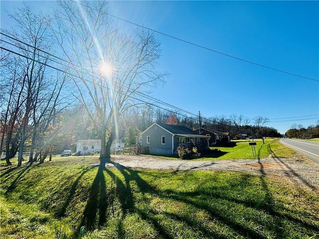 1699 W Pine St, Mount Airy, NC 27030 - view of side of property with a lawn
