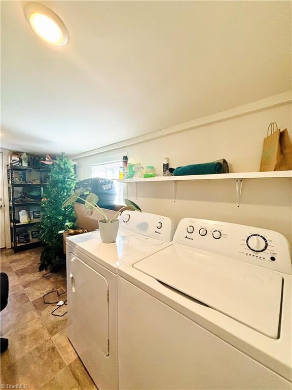 laundry room featuring independent washer and dryer