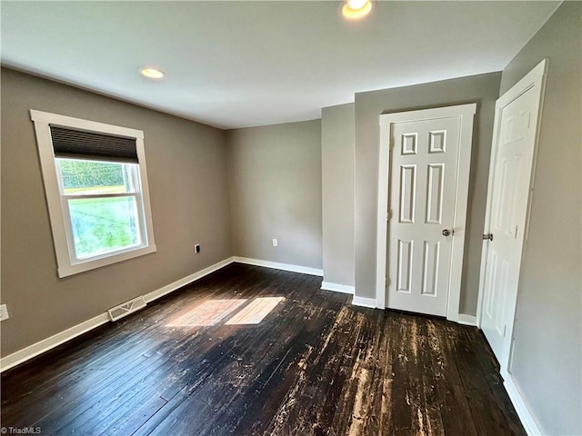 1699 W Pine St, Mount Airy, NC 27030 - empty room with dark wood-style flooring, baseboards, and recessed lighting