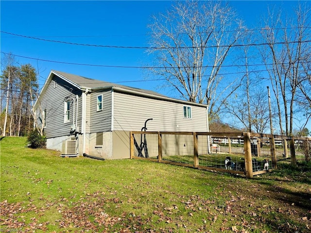 1699 W Pine St, Mount Airy, NC 27030 - view of side of home with a lawn and central AC unit