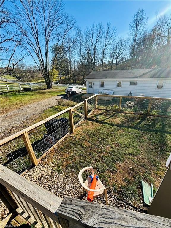 1699 W Pine St, Mount Airy, NC 27030 - view of yard with gravel driveway