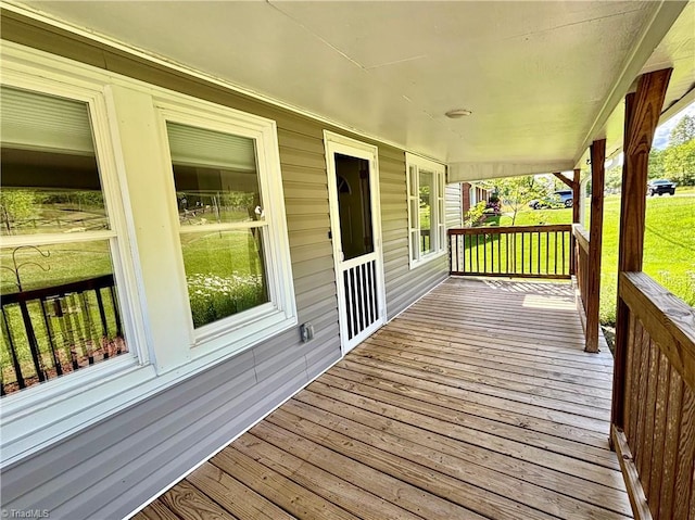 1699 W Pine St, Mount Airy, NC 27030 - wooden porch with a yard