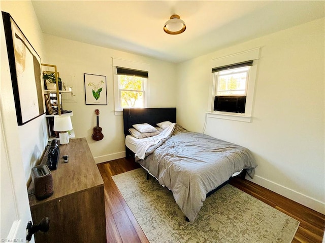 bedroom featuring dark hardwood / wood-style floors