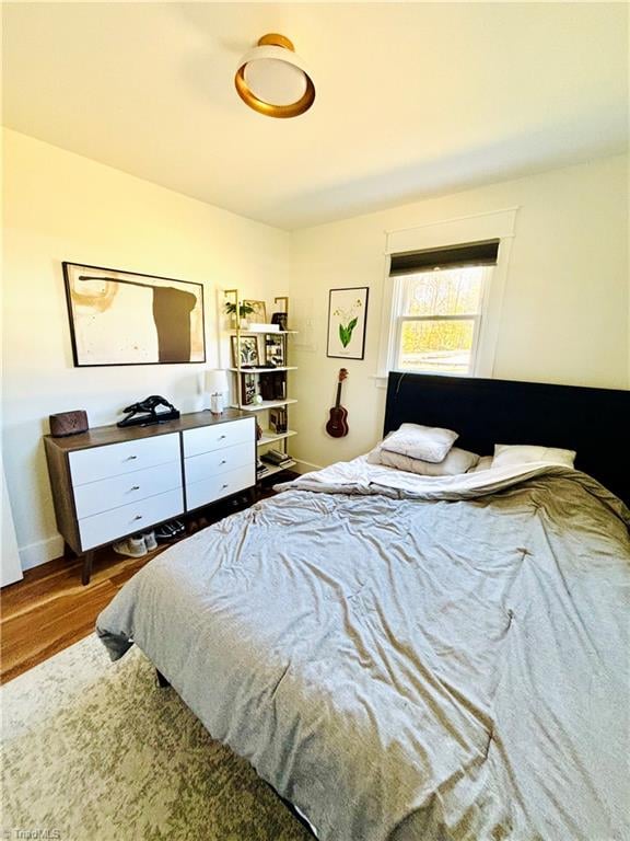 bedroom featuring hardwood / wood-style flooring