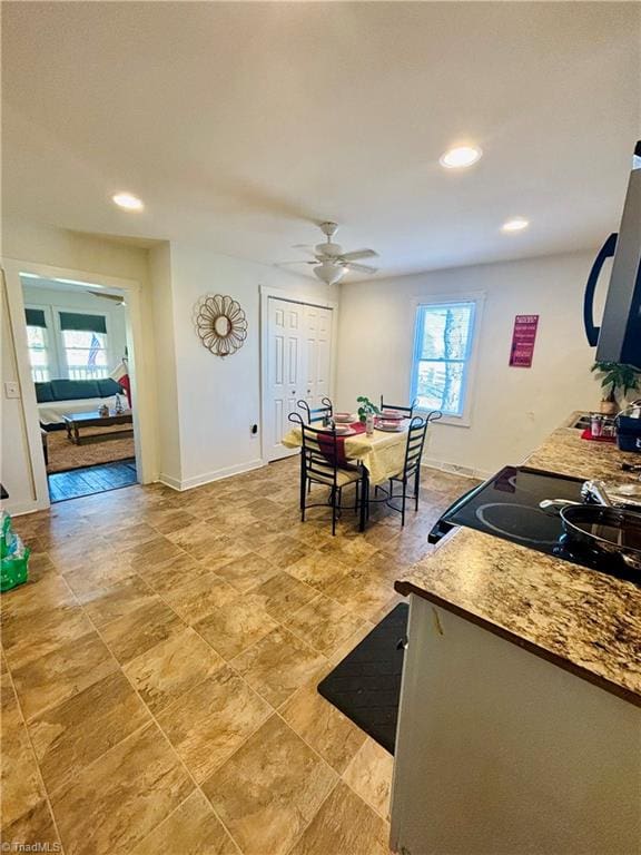 dining area featuring ceiling fan