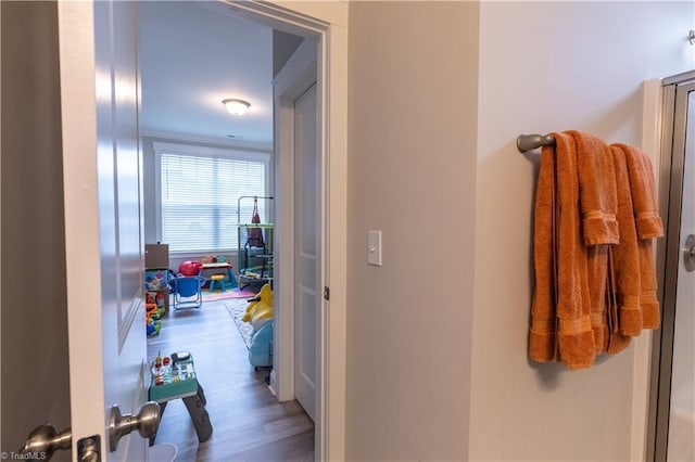 hall with wood finished floors