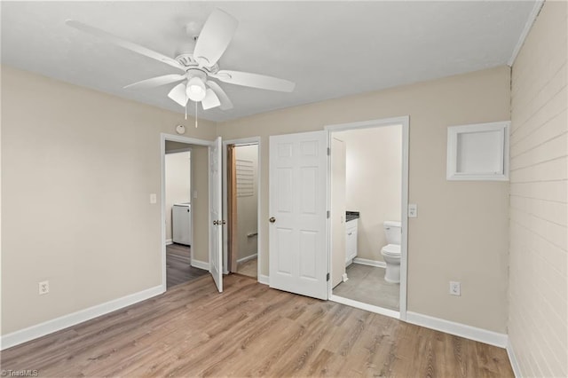 5054 Meadowbrook Dr, Trinity, NC 27370 - unfurnished bedroom featuring light wood finished floors, ensuite bath, washer / dryer, a closet, and ceiling fan