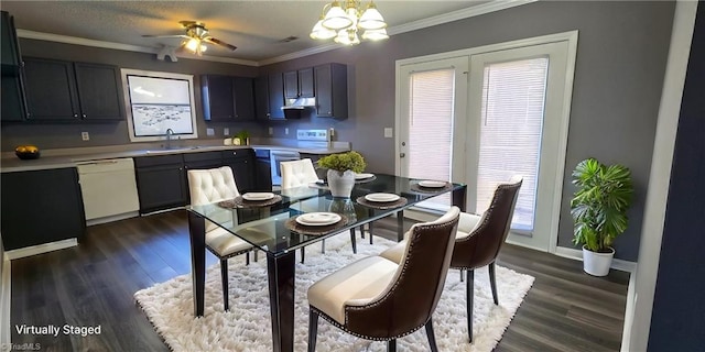 kitchen with ceiling fan with notable chandelier, white dishwasher, dark wood-type flooring, crown molding, and sink