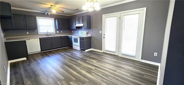 kitchen with a textured ceiling, white appliances, ceiling fan, sink, and dark hardwood / wood-style floors