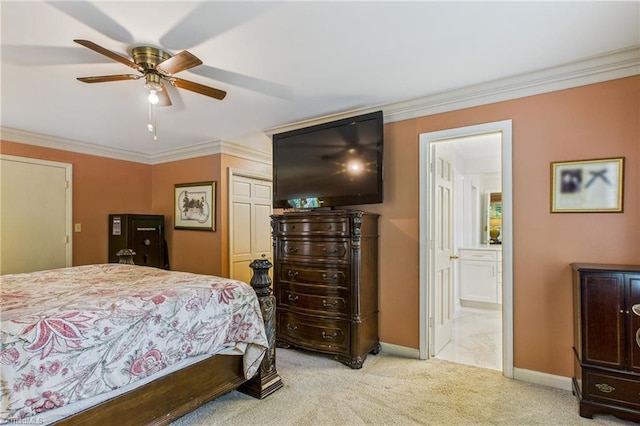 1317 Longcreek Dr, High Point, NC 27262 - carpeted bedroom with crown molding, baseboards, ensuite bath, a closet, and a ceiling fan