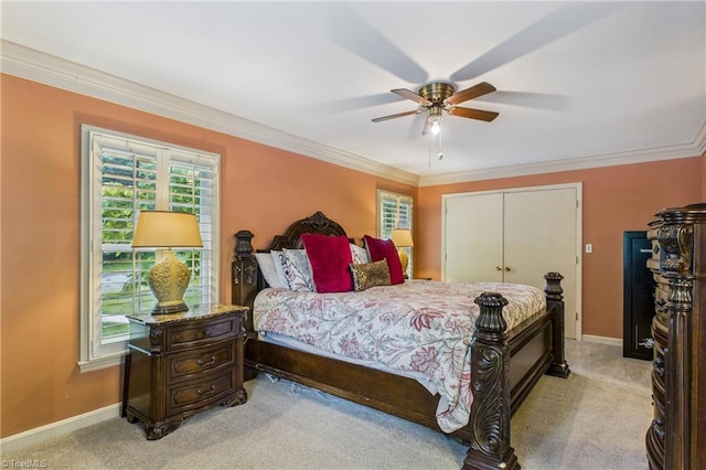 1317 Longcreek Dr, High Point, NC 27262 - bedroom with light carpet, baseboards, crown molding, a closet, and ceiling fan