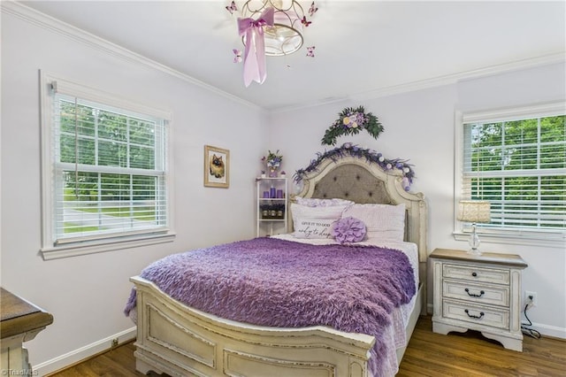 1317 Longcreek Dr, High Point, NC 27262 - bedroom featuring multiple windows, ornamental molding, wood finished floors, baseboards, and a chandelier