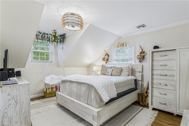 1317 Longcreek Dr, High Point, NC 27262 - bedroom with wood finished floors, crown molding, and vaulted ceiling