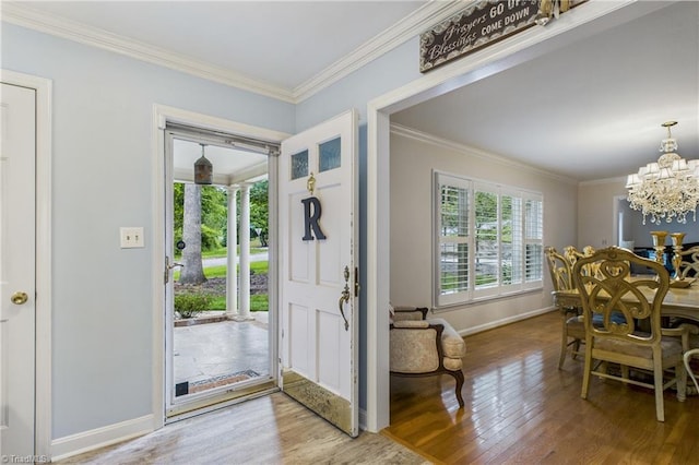 1317 Longcreek Dr, High Point, NC 27262 - foyer featuring a chandelier, wood finished floors, baseboards, and crown molding