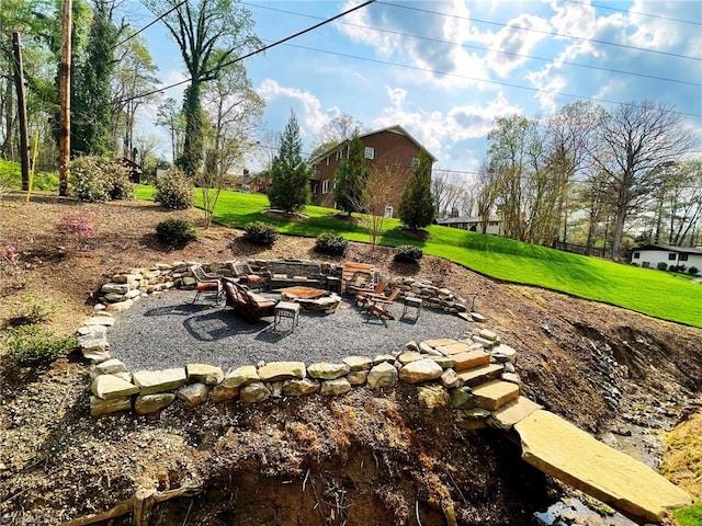 1317 Longcreek Dr, High Point, NC 27262 - view of grassy yard featuring a fire pit and a patio