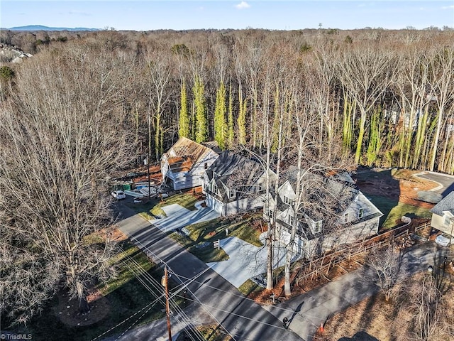 bird's eye view featuring a forest view