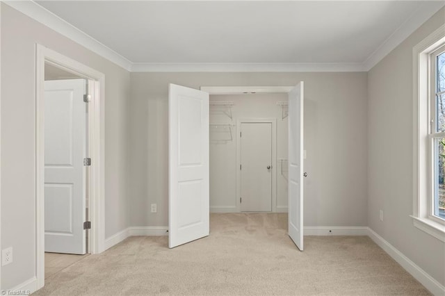 unfurnished bedroom with light carpet, baseboards, and crown molding