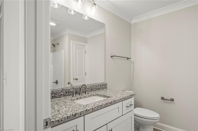 full bath with baseboards, a shower, toilet, crown molding, and vanity