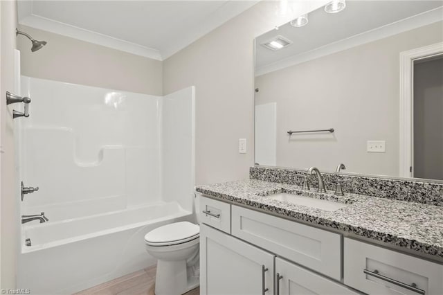 full bathroom featuring crown molding, shower / bathtub combination, visible vents, toilet, and vanity