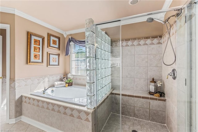3116 Lodge Dr, Jamestown, NC 27282 - bathroom featuring a bath, a shower stall, ornamental molding, and tile patterned floors