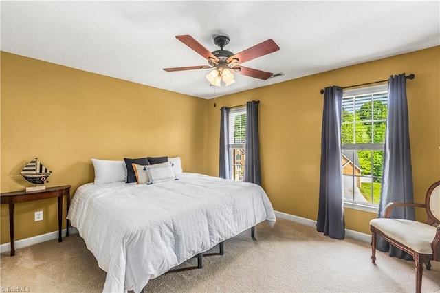 3116 Lodge Dr, Jamestown, NC 27282 - bedroom featuring baseboards, carpet flooring, and ceiling fan