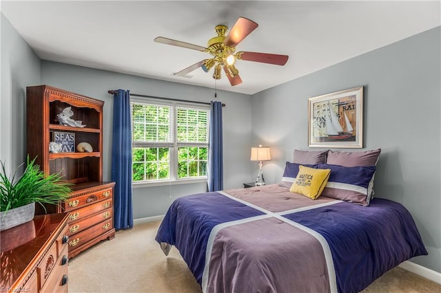 3116 Lodge Dr, Jamestown, NC 27282 - bedroom featuring carpet floors, ceiling fan, and baseboards