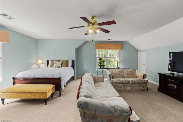 3116 Lodge Dr, Jamestown, NC 27282 - carpeted bedroom featuring ceiling fan, vaulted ceiling, and baseboards