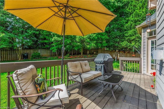 3116 Lodge Dr, Jamestown, NC 27282 - deck featuring a fenced backyard, an outdoor living space, and grilling area
