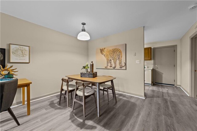 dining room featuring hardwood / wood-style floors