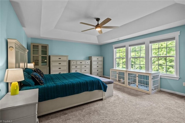 7615 Mary Ellen Ct, Greensboro, NC 27409 - carpeted bedroom featuring a raised ceiling and ceiling fan