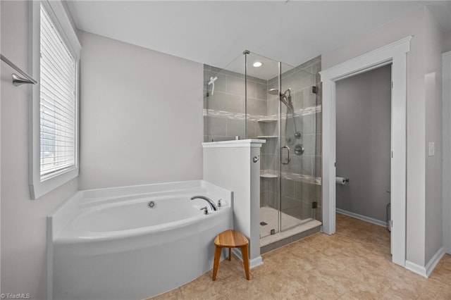 7615 Mary Ellen Ct, Greensboro, NC 27409 - bathroom featuring a bath and a stall shower