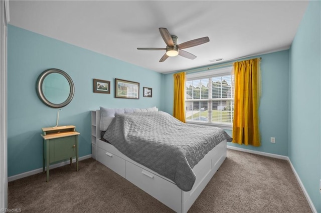 7615 Mary Ellen Ct, Greensboro, NC 27409 - carpeted bedroom with baseboards and ceiling fan