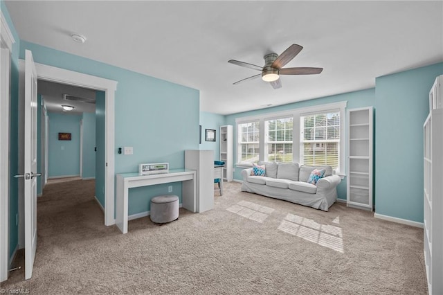 7615 Mary Ellen Ct, Greensboro, NC 27409 - carpeted living area featuring a ceiling fan and baseboards