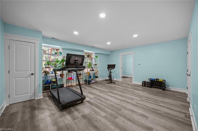 7615 Mary Ellen Ct, Greensboro, NC 27409 - workout area with wood finished floors and recessed lighting