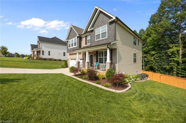 7615 Mary Ellen Ct, Greensboro, NC 27409 - craftsman-style home with a porch, brick siding, an attached garage, and driveway