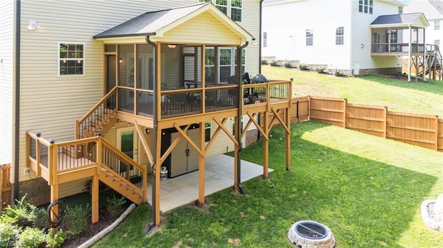 7615 Mary Ellen Ct, Greensboro, NC 27409 - back of house with a sunroom, stairway, a patio, and a deck