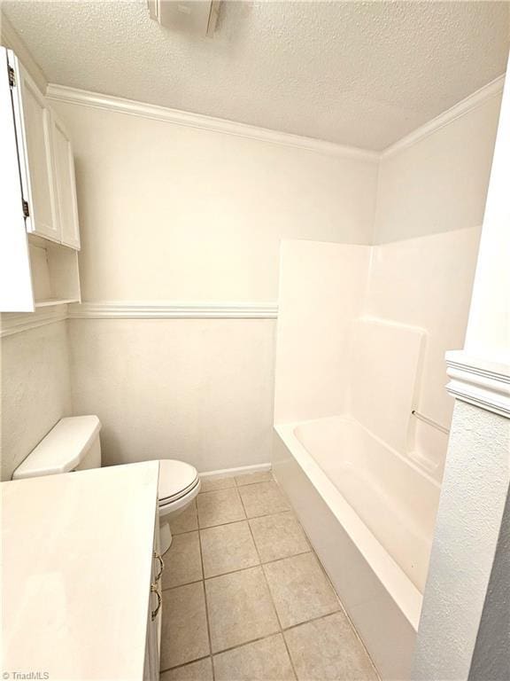 full bathroom featuring tile patterned flooring, separate shower and tub, vanity, a textured ceiling, and toilet