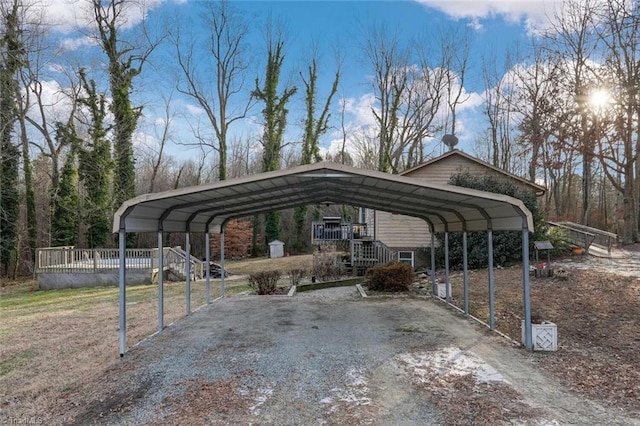 view of vehicle parking with driveway and a carport